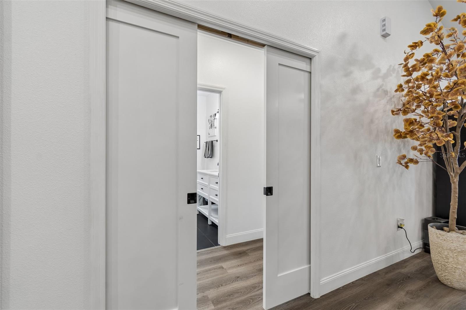 Pocket doors to bedroom 2&3 and bathroom