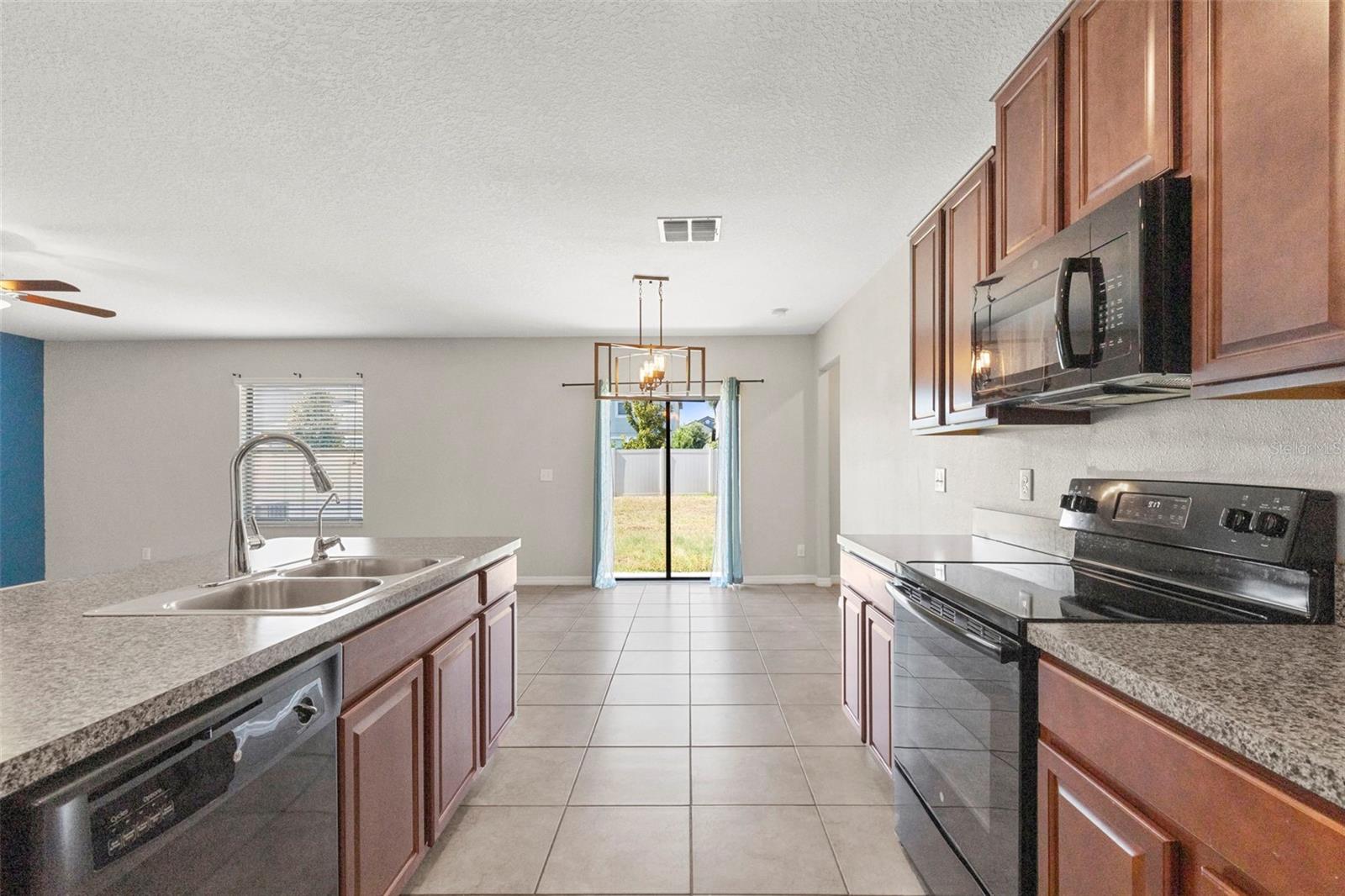 PLENTY OF CABINET SPACE AND ROOM TO ENTERTAIN