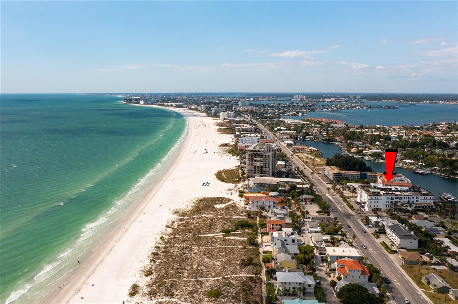 St. Pete's sugary beach sand directly across the street