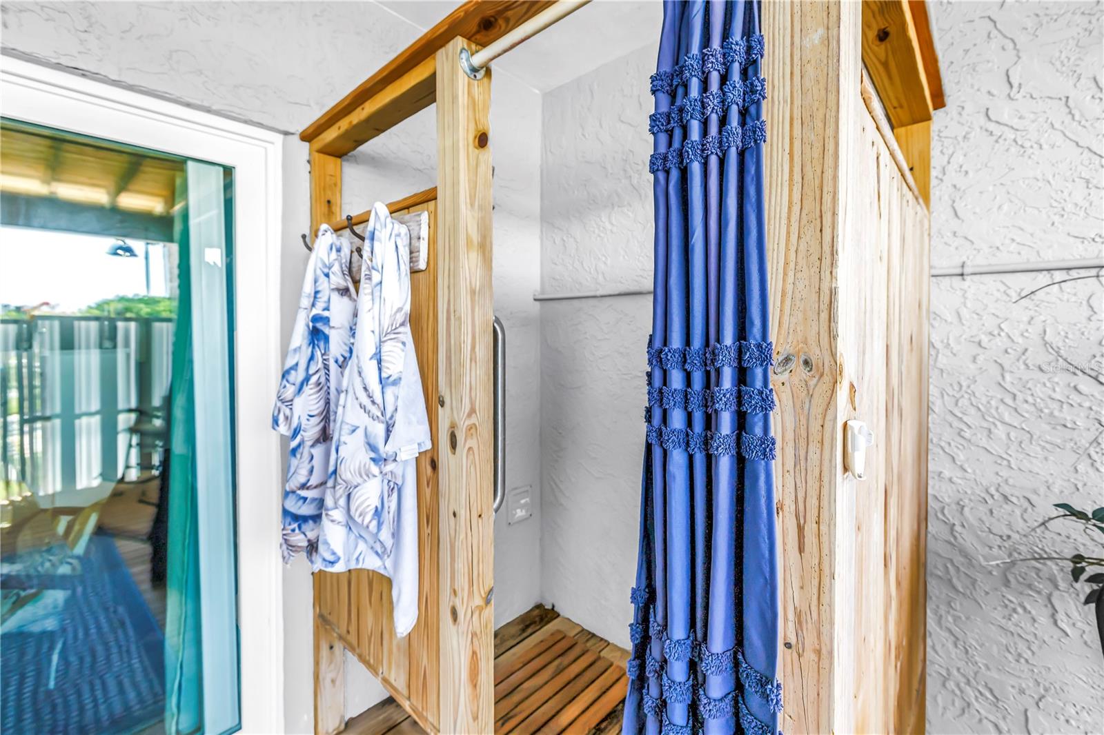 Ground level patio level outdoor shower
