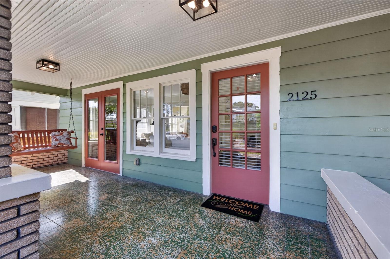 Massive front porch with swing