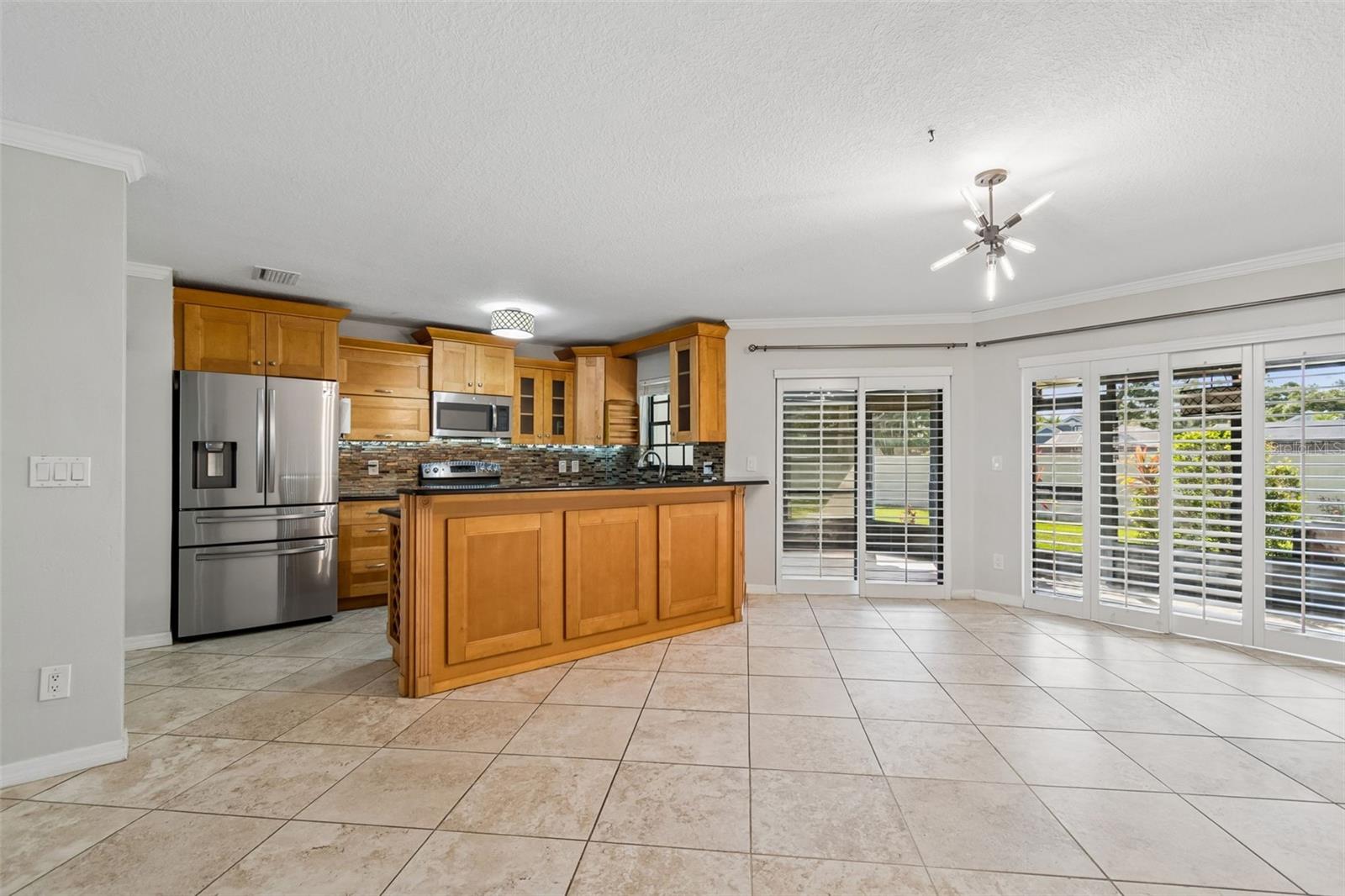 View to Enclosed Patio with Sliding Doors