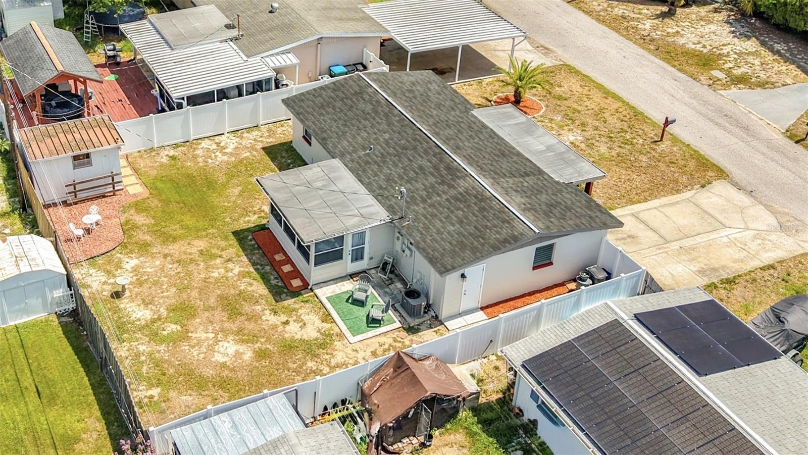 backyard with patio and shed with electric