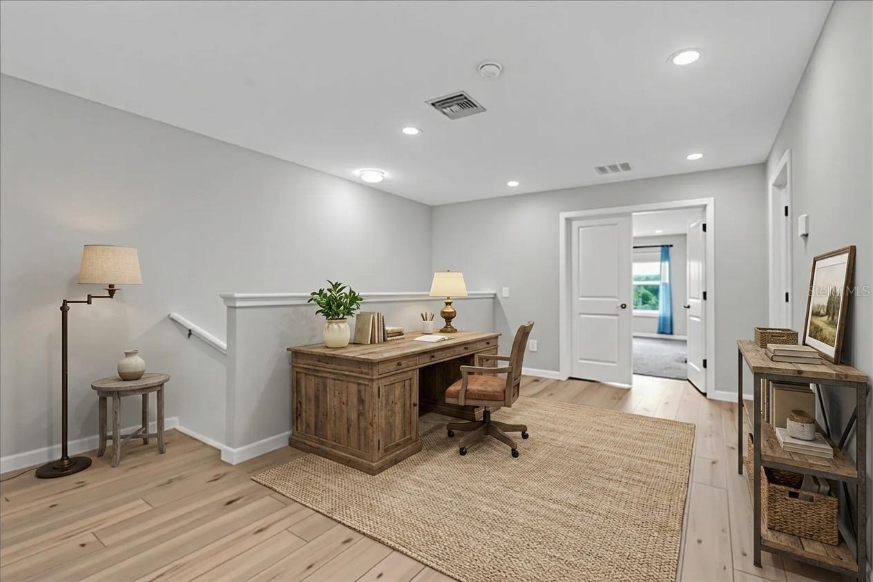 upstairs loft virtual staged as office space