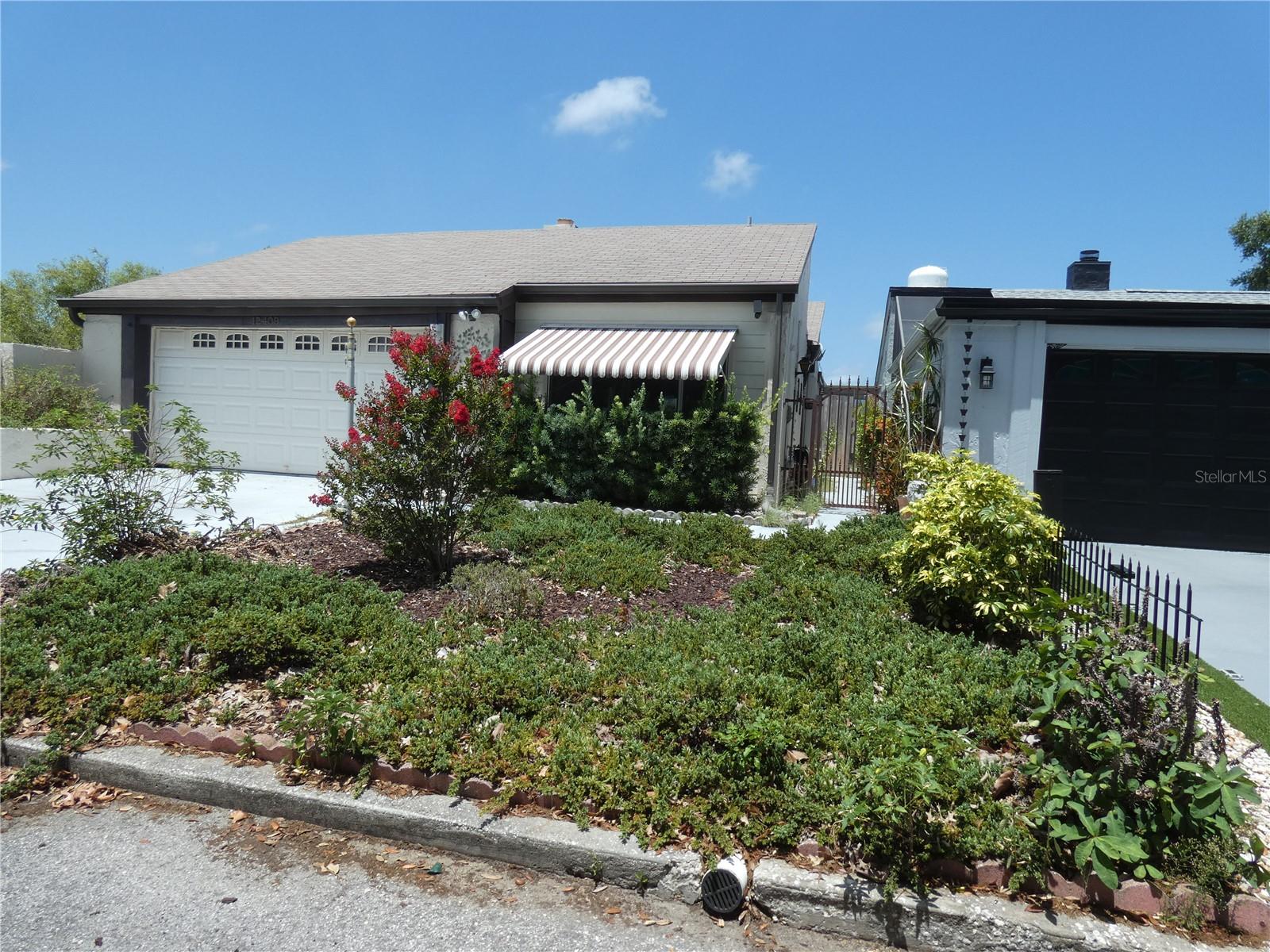 Pool home,3 Bedroom, 2bath, 2 car garage end unit.
