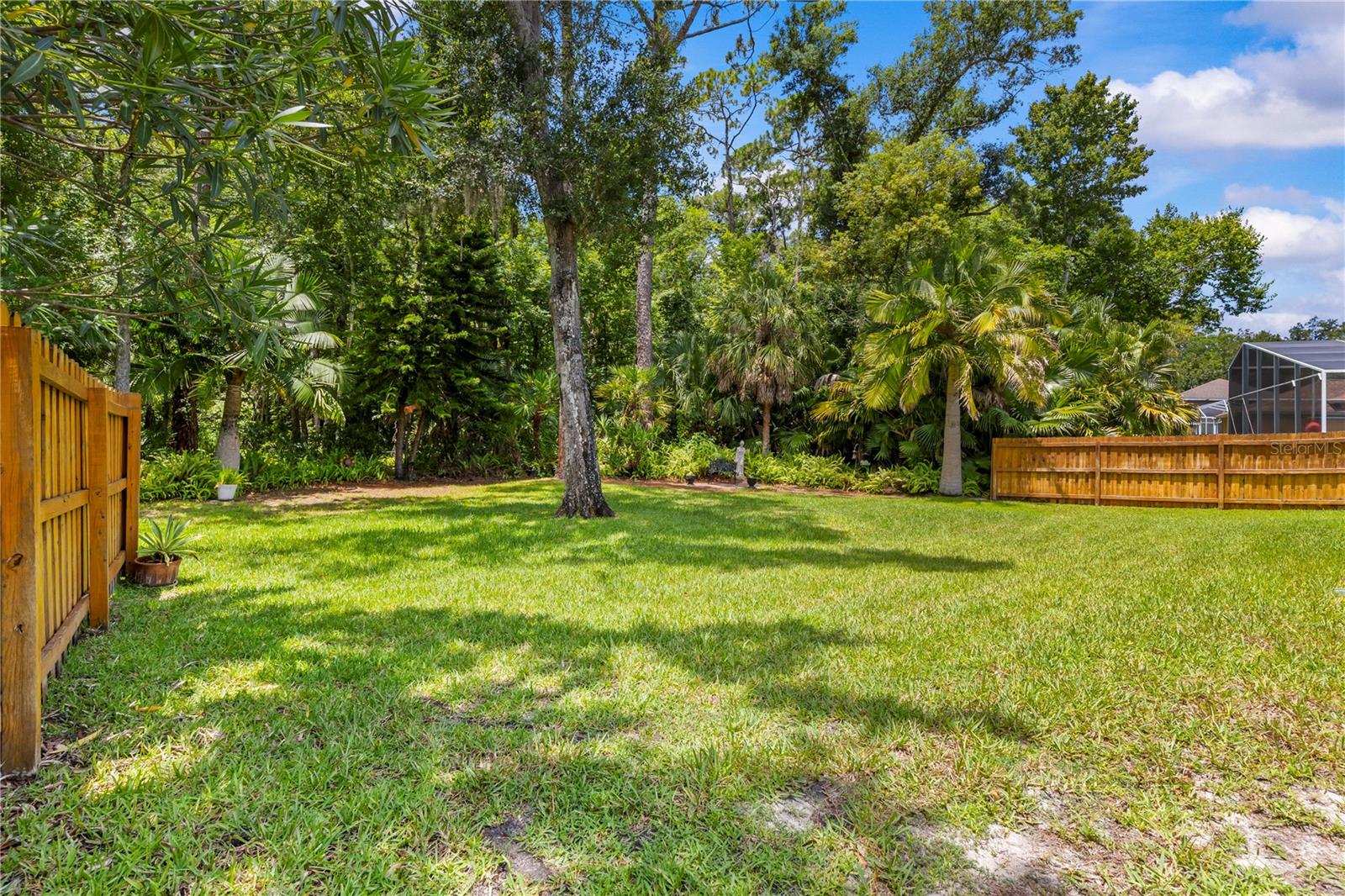 Lot goes past the end of the privacy fence.