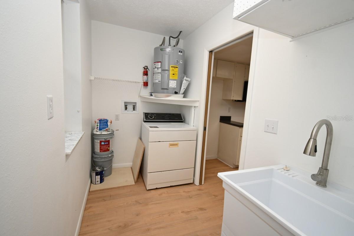 LAUNDRY RM OFF THE KITCHEN