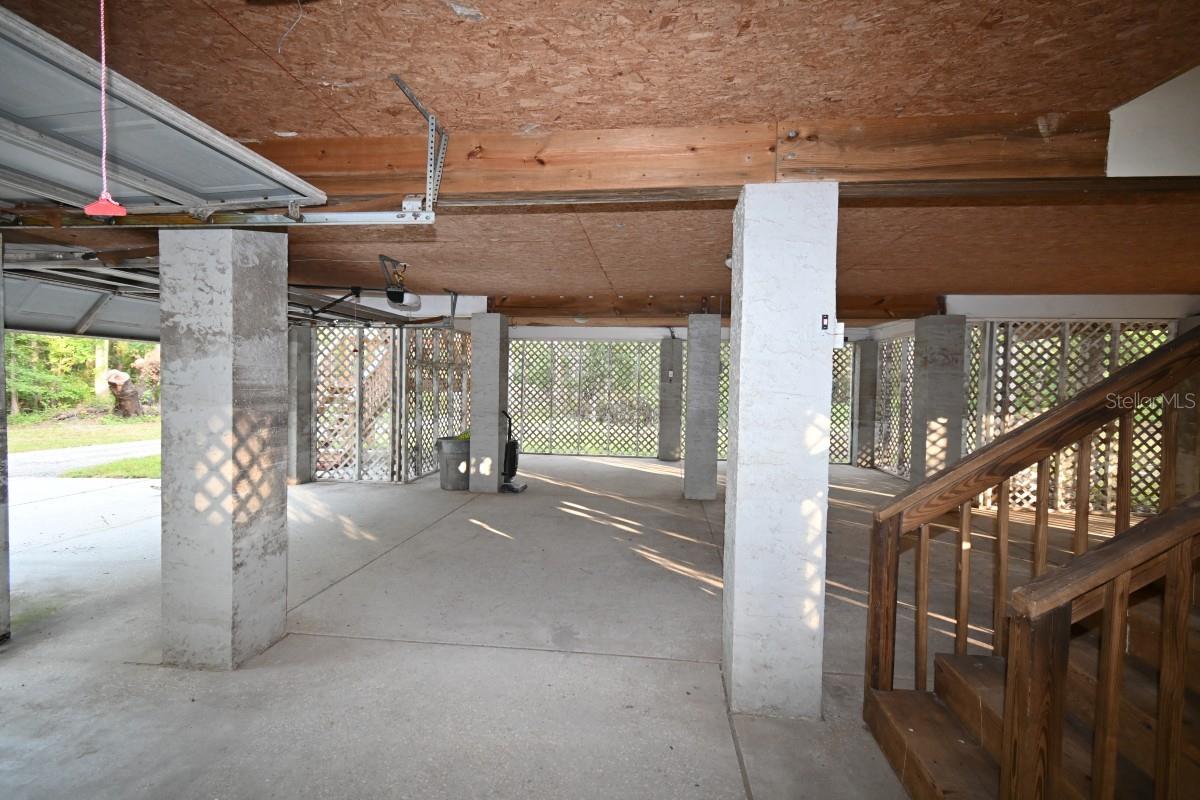 ACCESS TO INTERIOR HOME AT GARAGE LEVEL