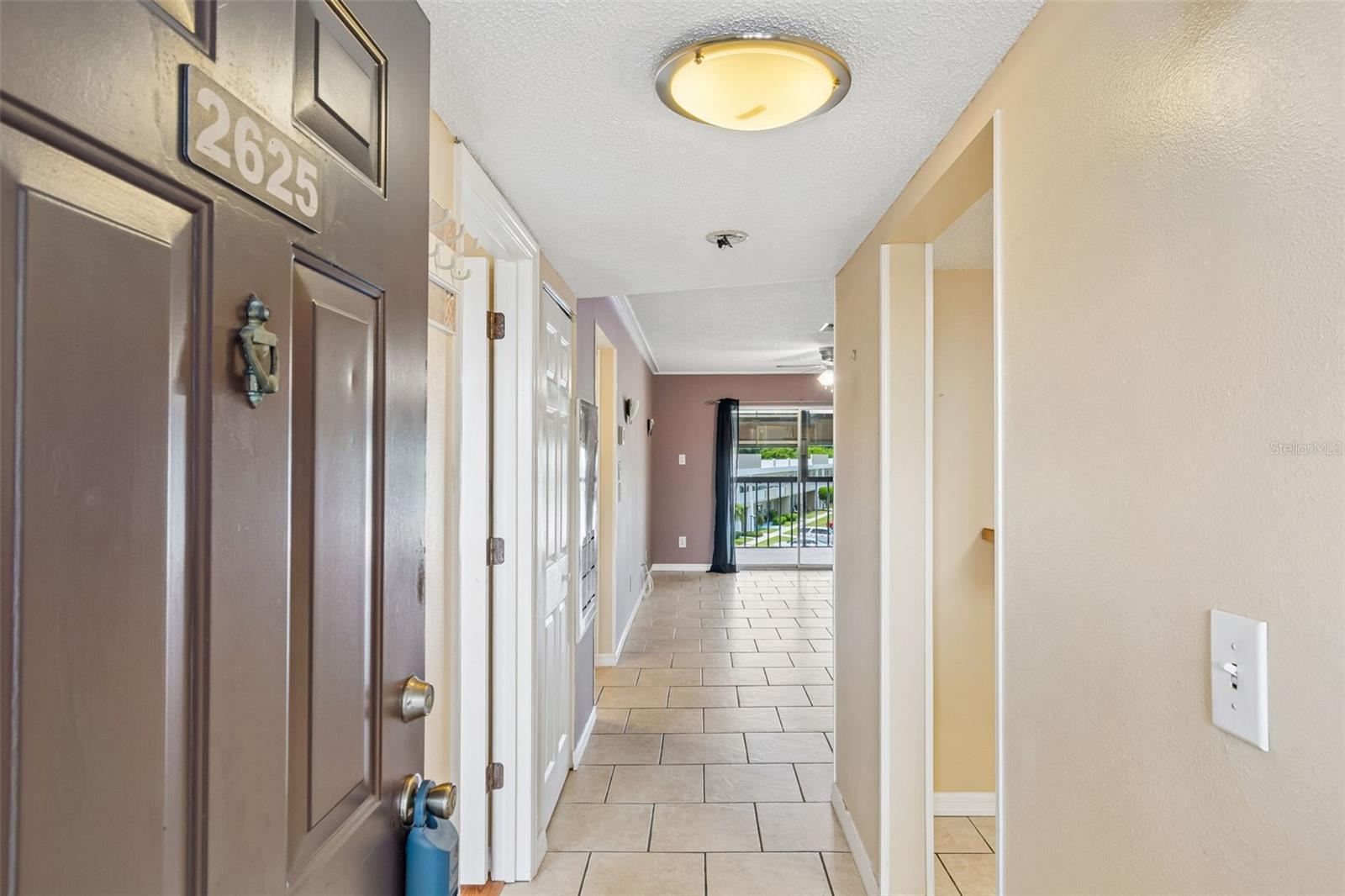 Entering the condo thru the front door.