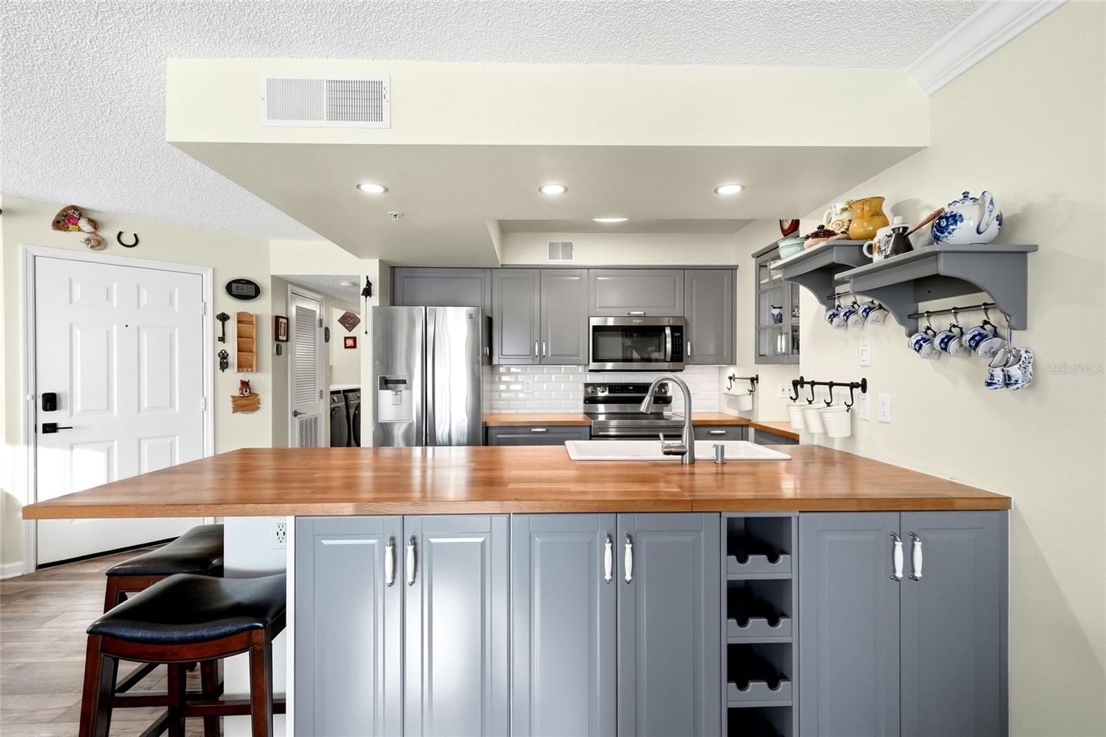Spacious remodeled kitchen with abundant cabinet storage