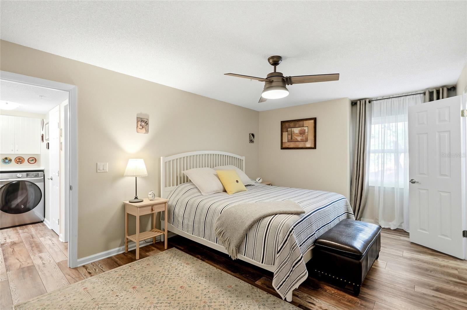 Spacious primary suite with a private en-suite bathroom and walk-in closet