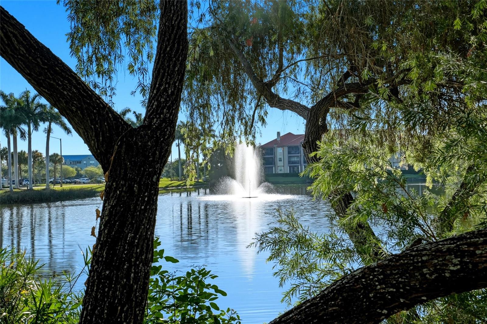 Peaceful pond view with a beautiful fountain, enjoyed from the private balcony