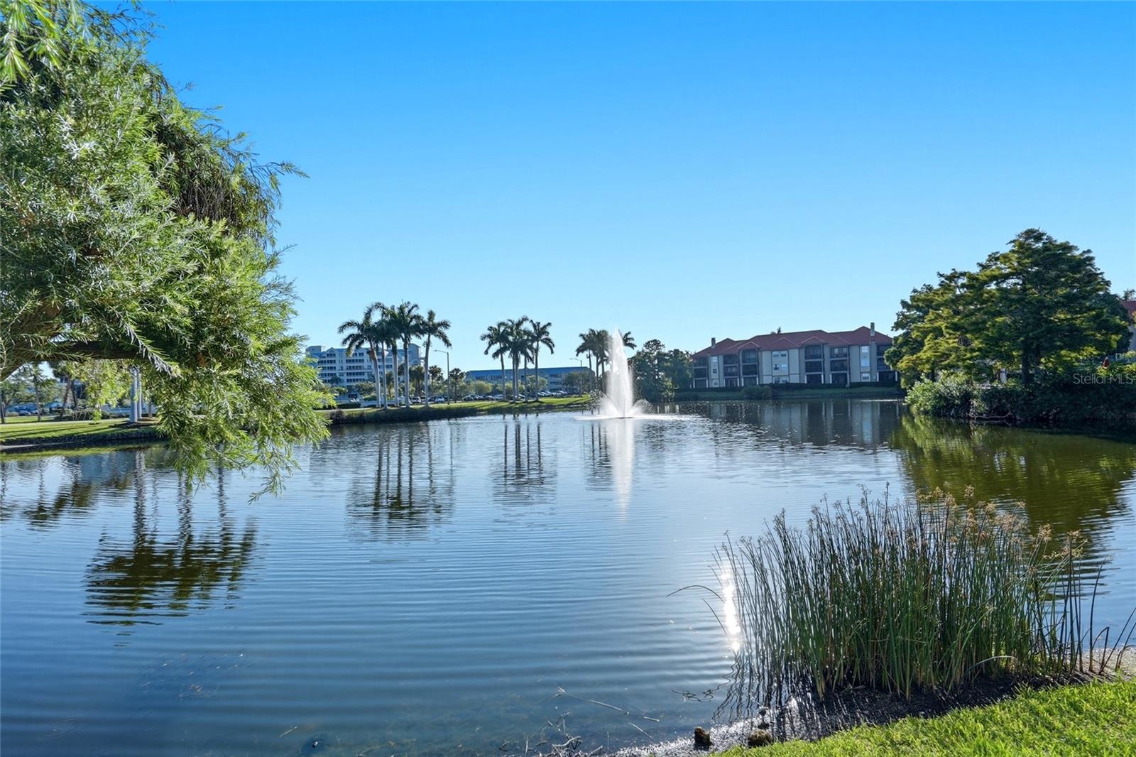 Peaceful pond view with a beautiful fountain, enjoyed from the private balcony