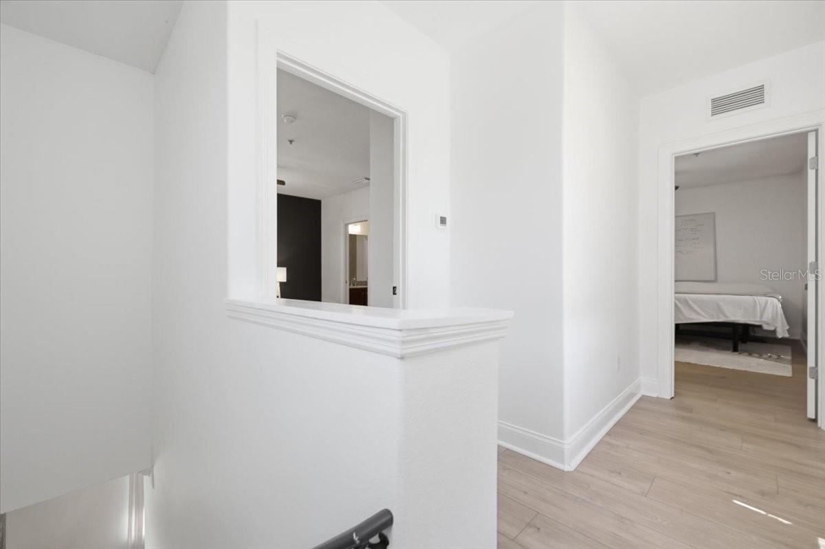 Upstairs area with white oak LVP