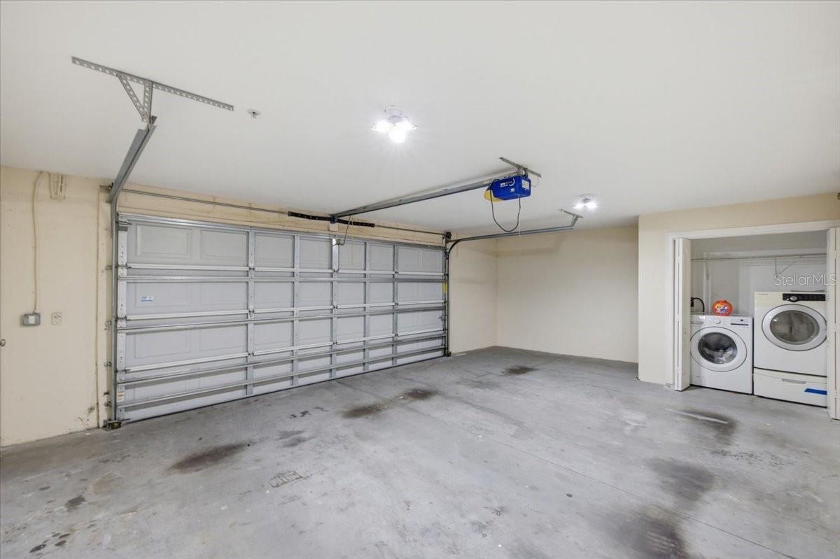 Large garage and washer / dryer closet.
