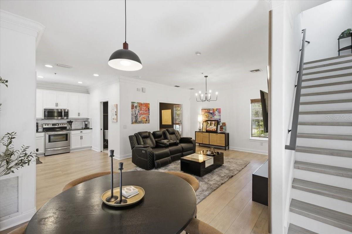 Angle from dining area into living room with all details