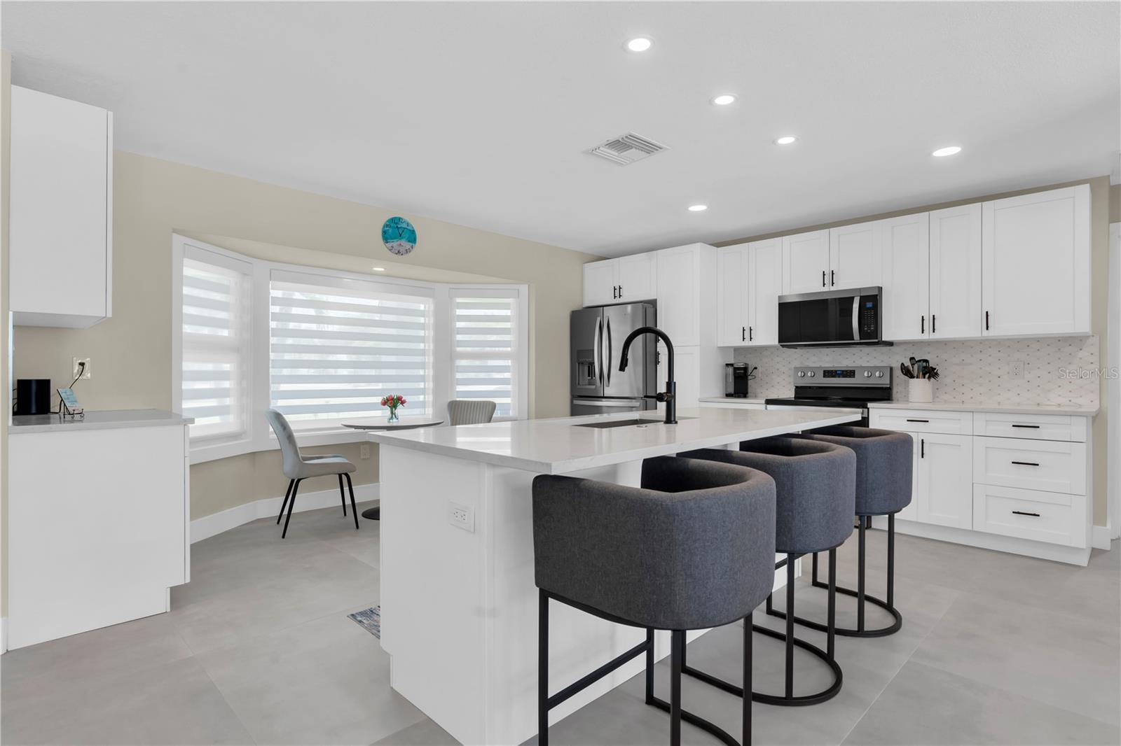 counter space and prep space with a water view