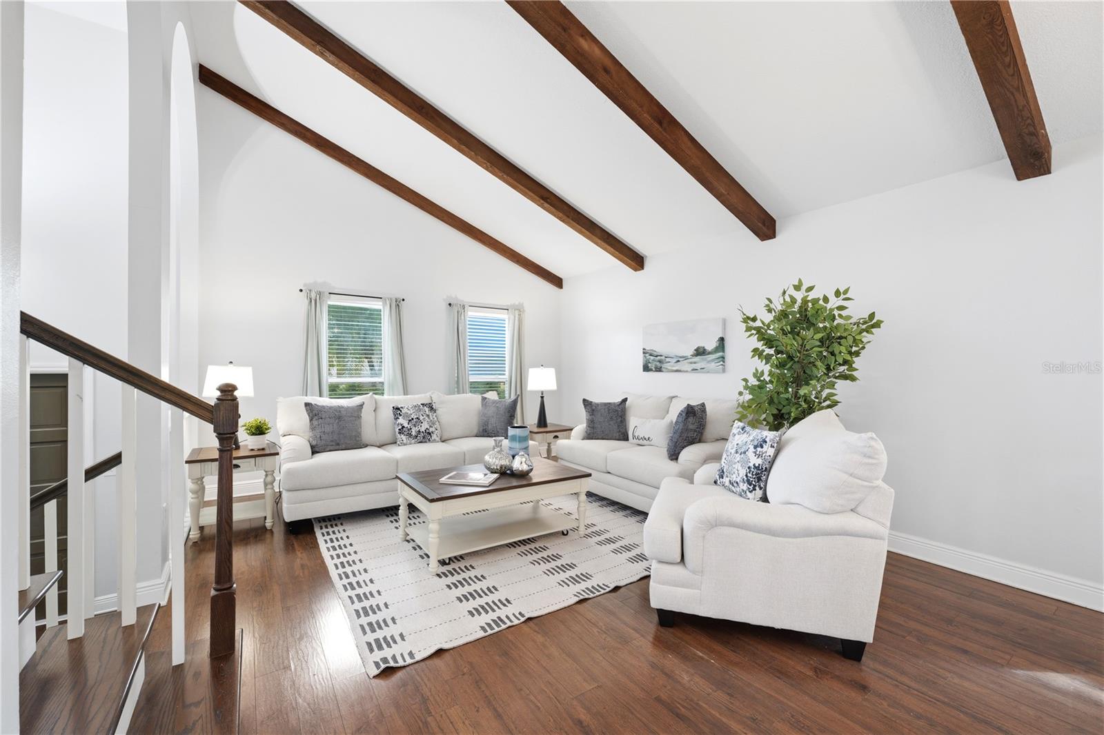 formal living room with lots of space for wine and cheese parties