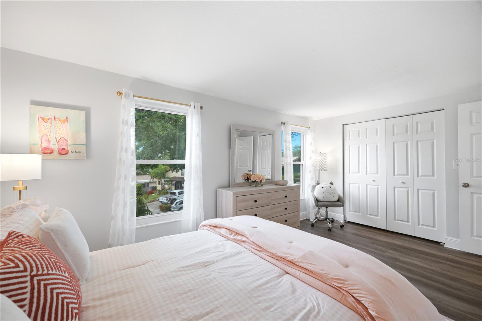 Oversized room with large windows bringing in lots of natural light