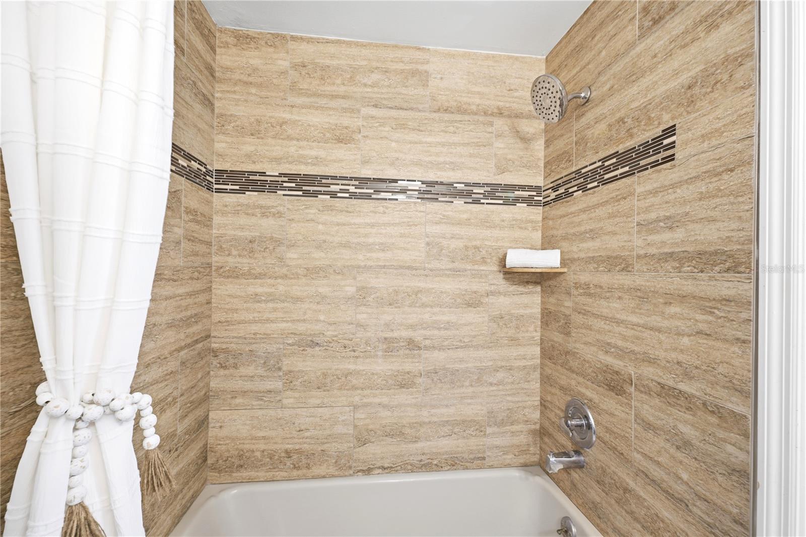 custom tile work in guest bathroom