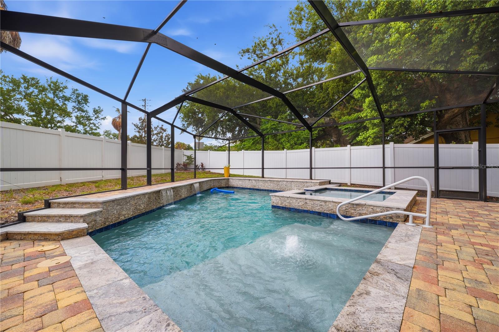 Pool has built in shallow sunning deck