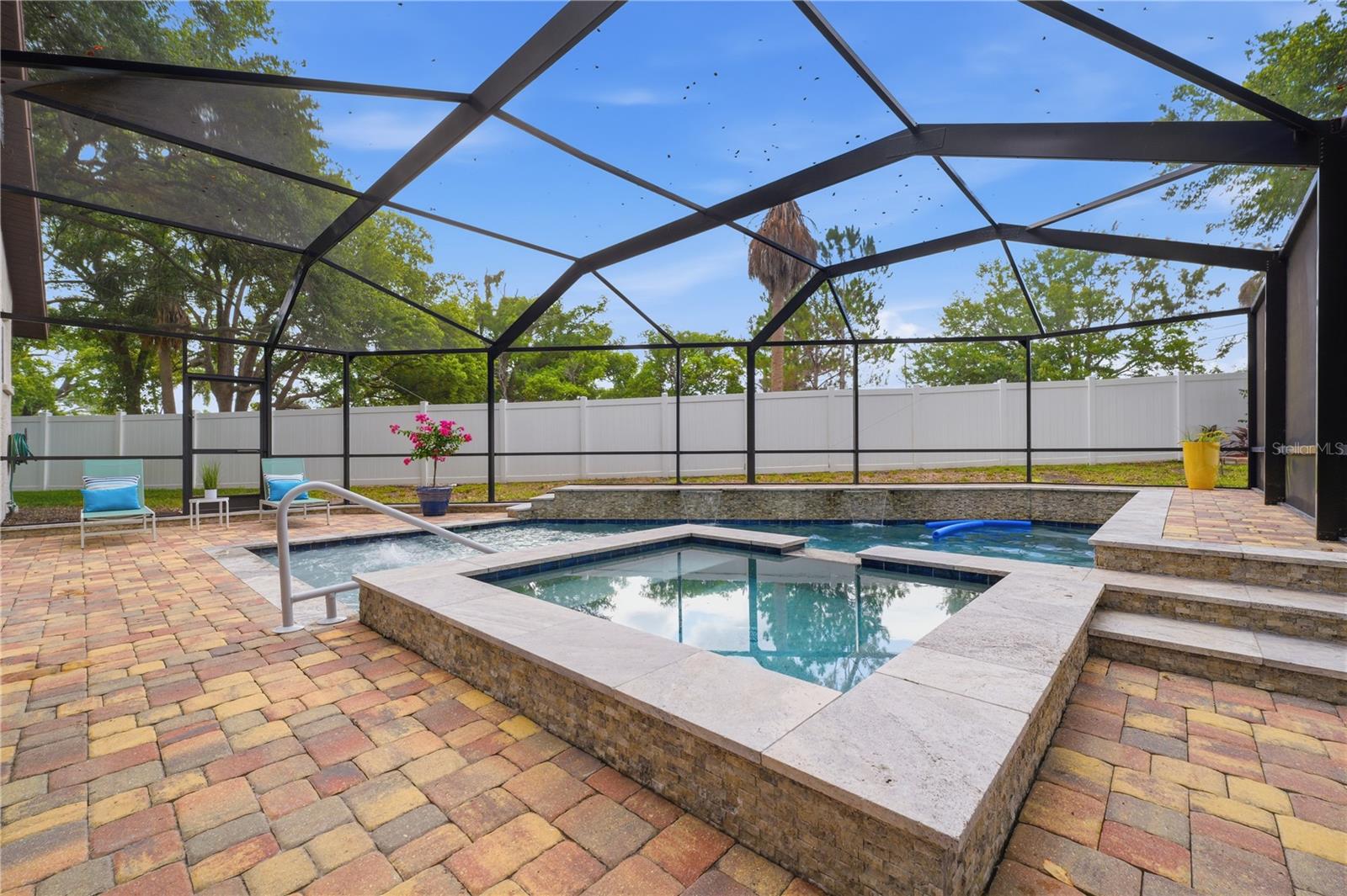 Screened in pool with huge side yard for the kids !!