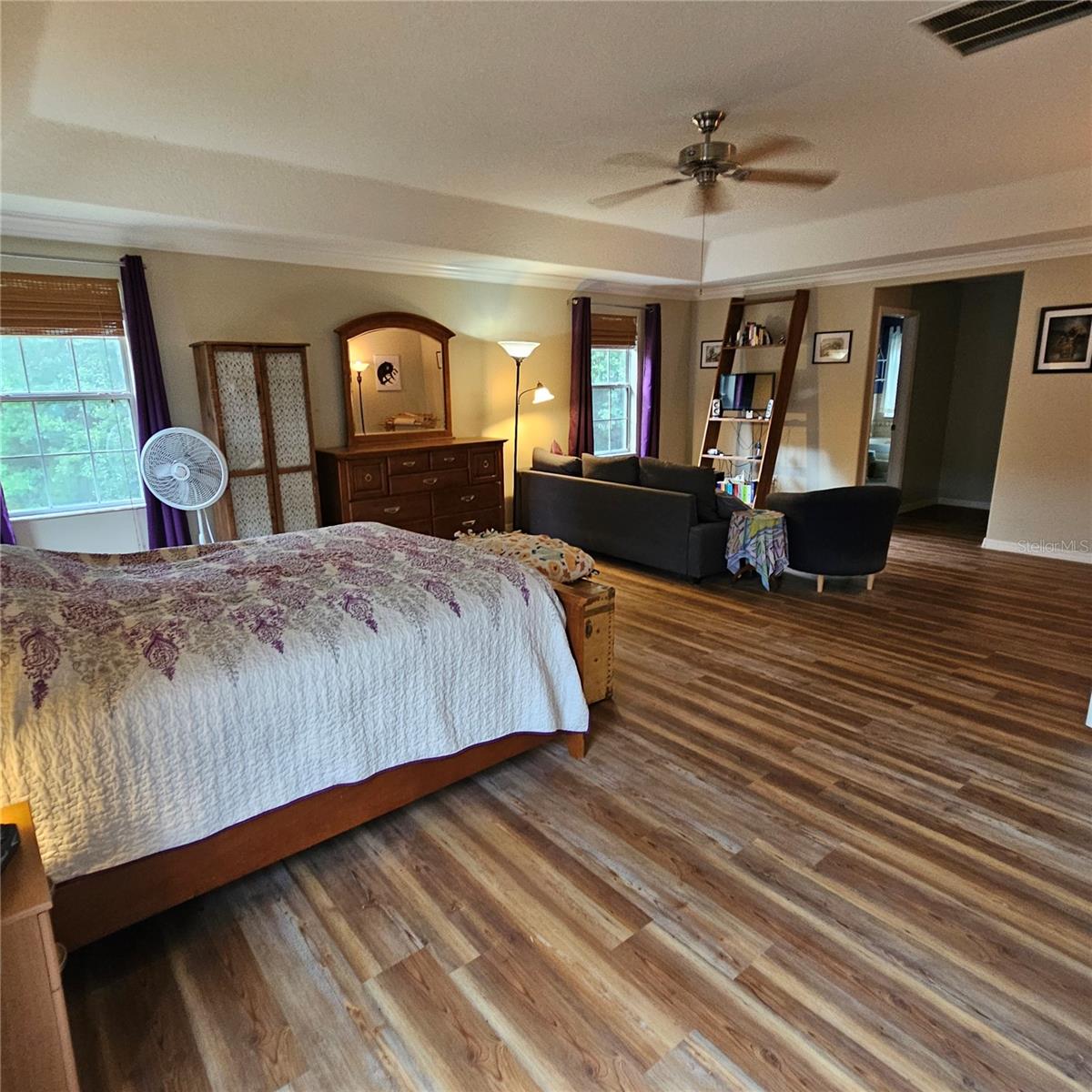 Primary Bedroom overlooks conservation backyard