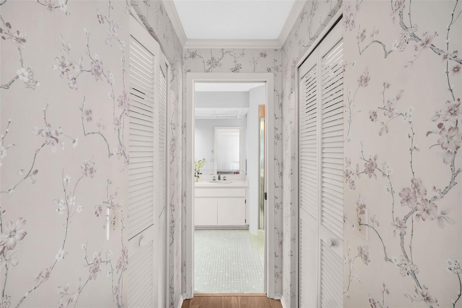 Hall with 2 walk-in closets leading to the en-suite~