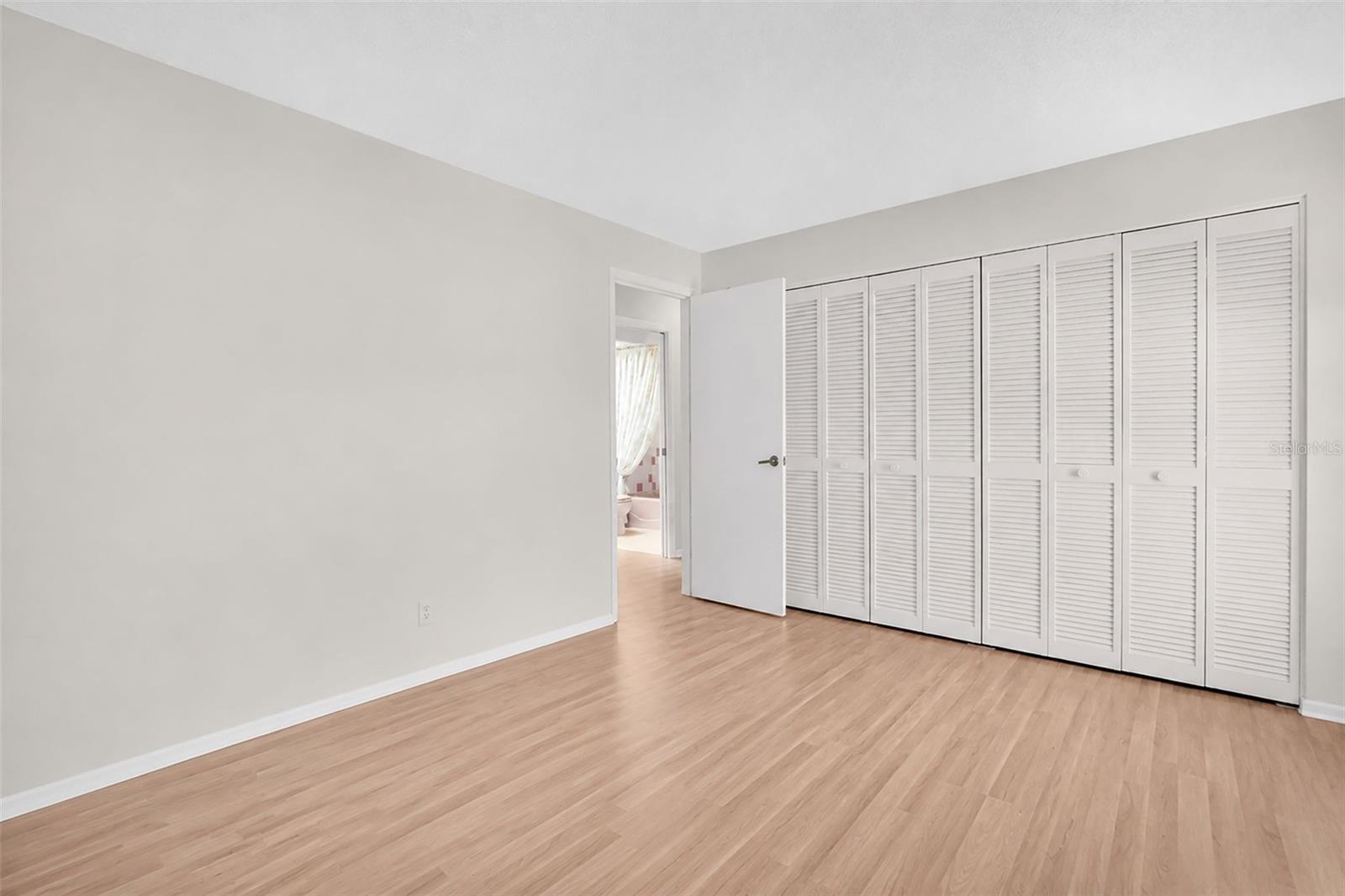 Two built-in closets offering plenty of storage space~