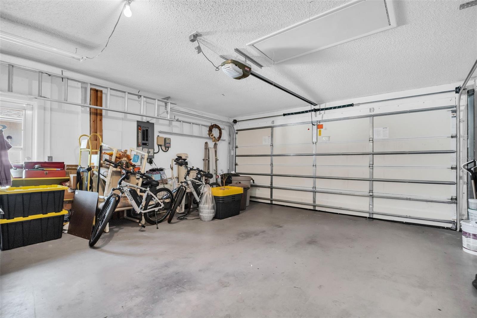 Large 2-car garage big enough for your car, golf cart, and all your toys~