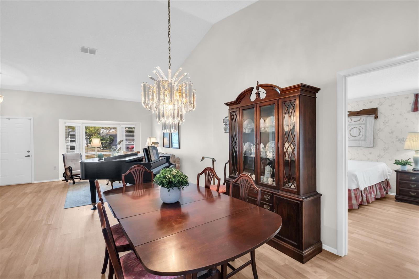 Spacious dining room perfectly tucked between the family room and kitchen~