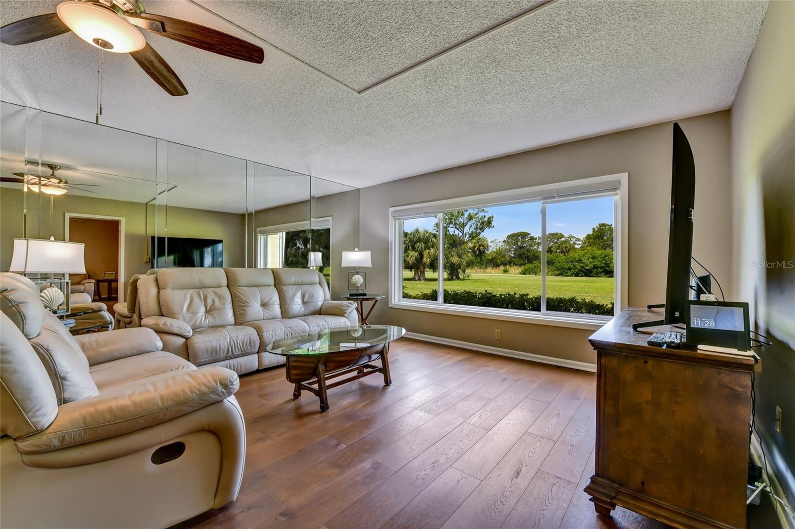 This room has solar shades with three panels with a rechargeable battery