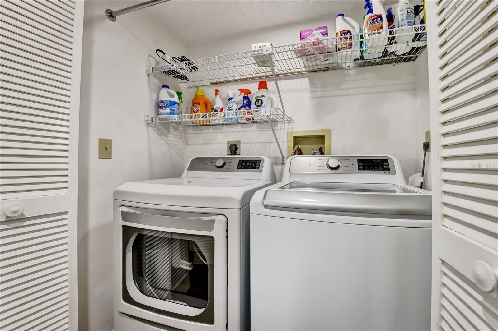 washer and dryer conveniently located.