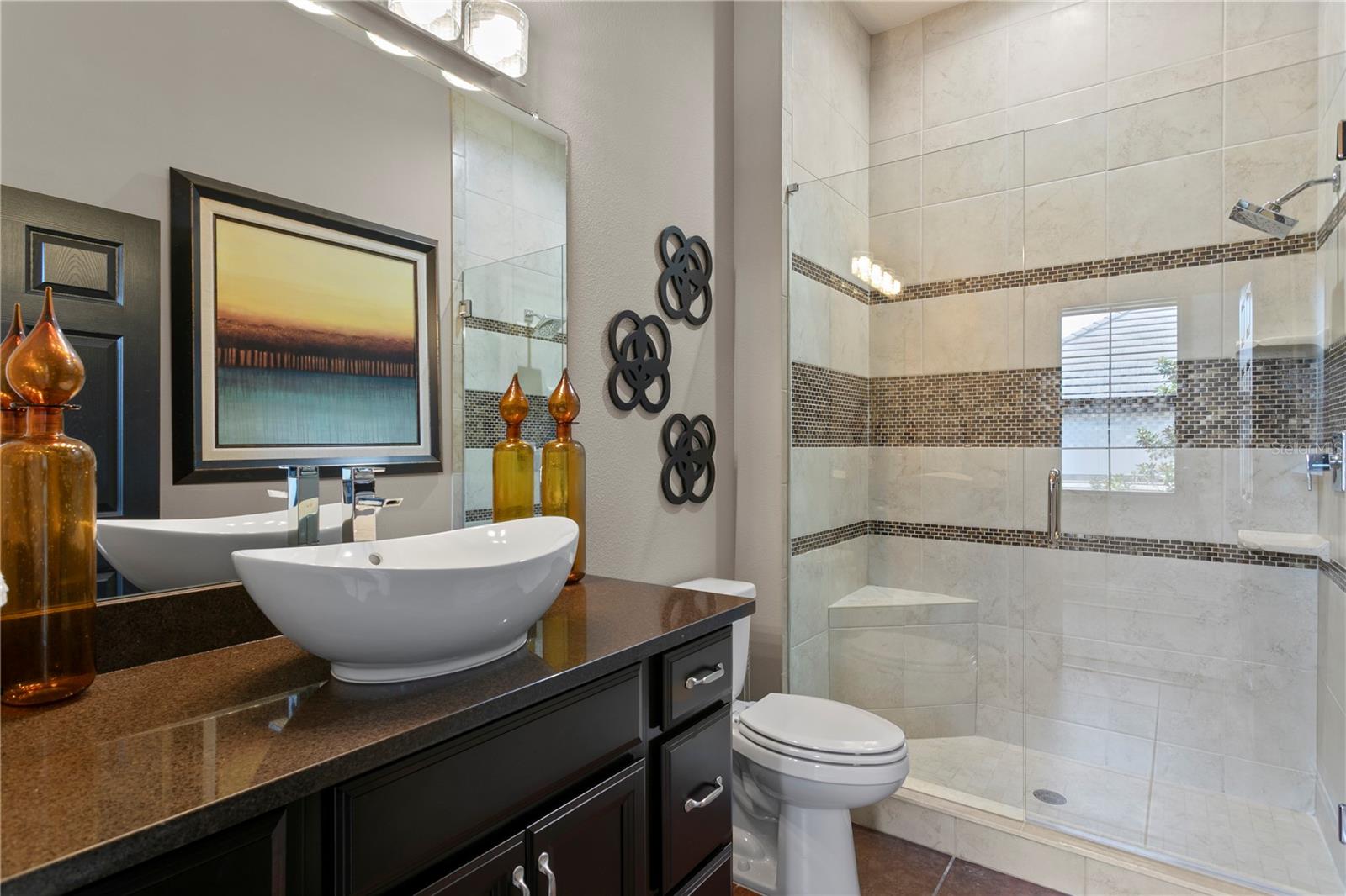 Attached bath in media room.