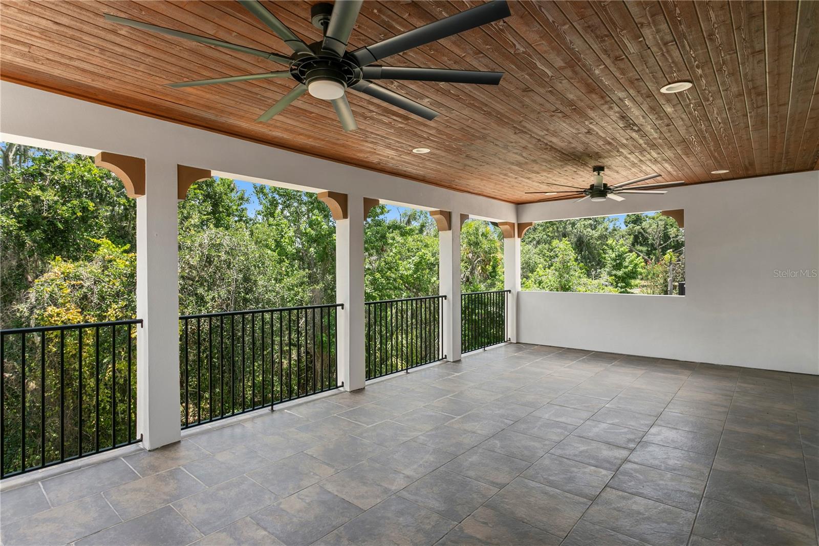 Elevated outdoor entertaining overlooking conservation.