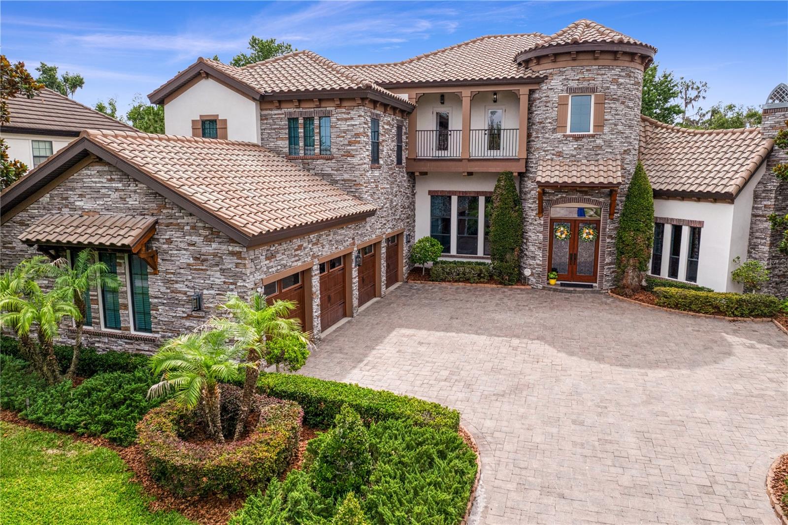 Oversized garage with premium curb appeal.
