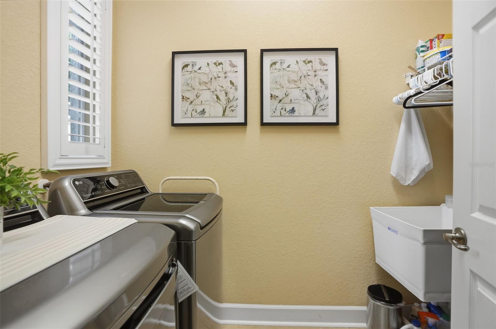 Large Laundry Room with laundry tub and window for natural light!