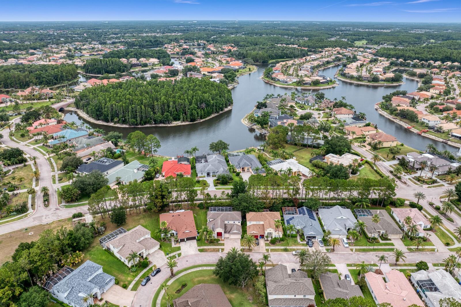 Aerial view above the property and beyond in Cory Lake Isles