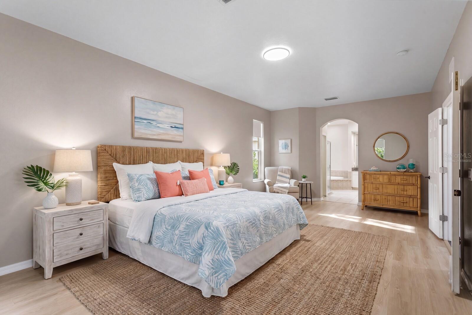 Primary Bedroom Downstairs- virtually staged