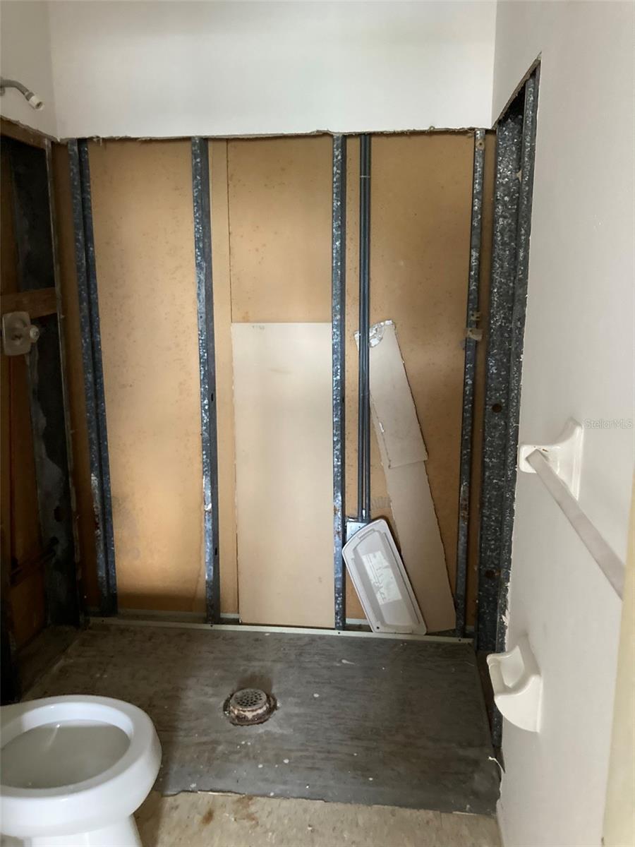 Master bath waiting for a new shower