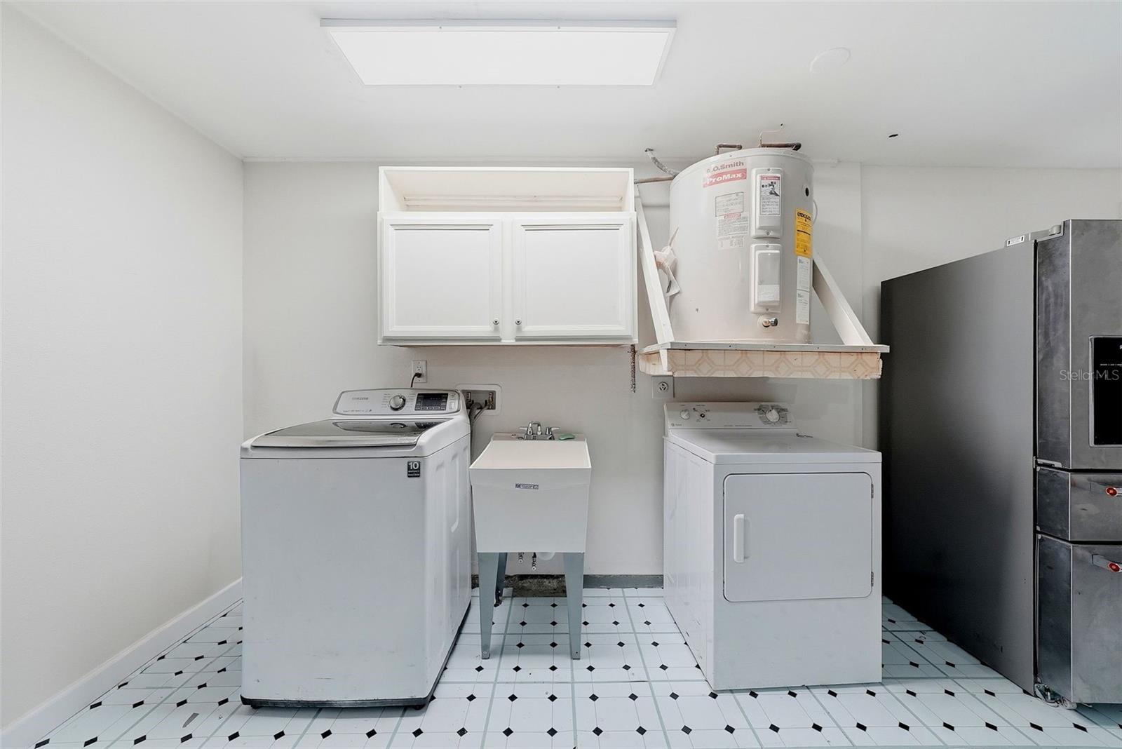 Laundry room in garage