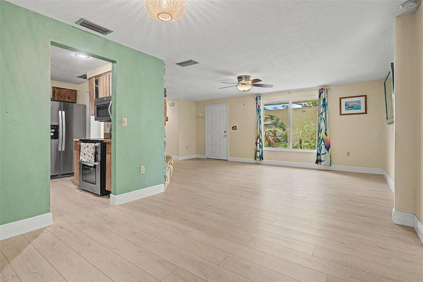 ADJOINING KITCHEN OFF LIVING & DINING ROOMS