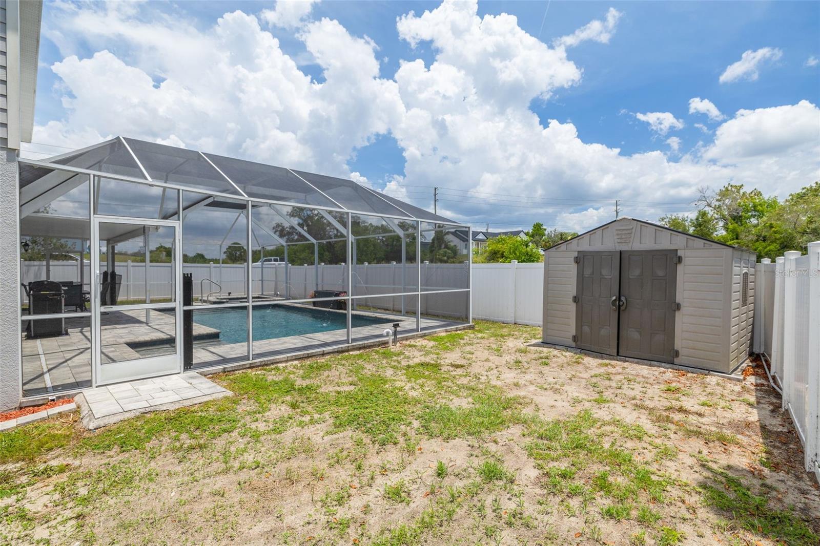 Additional features include double-pane tilt-in windows for effortless cleaning, and a storage shed