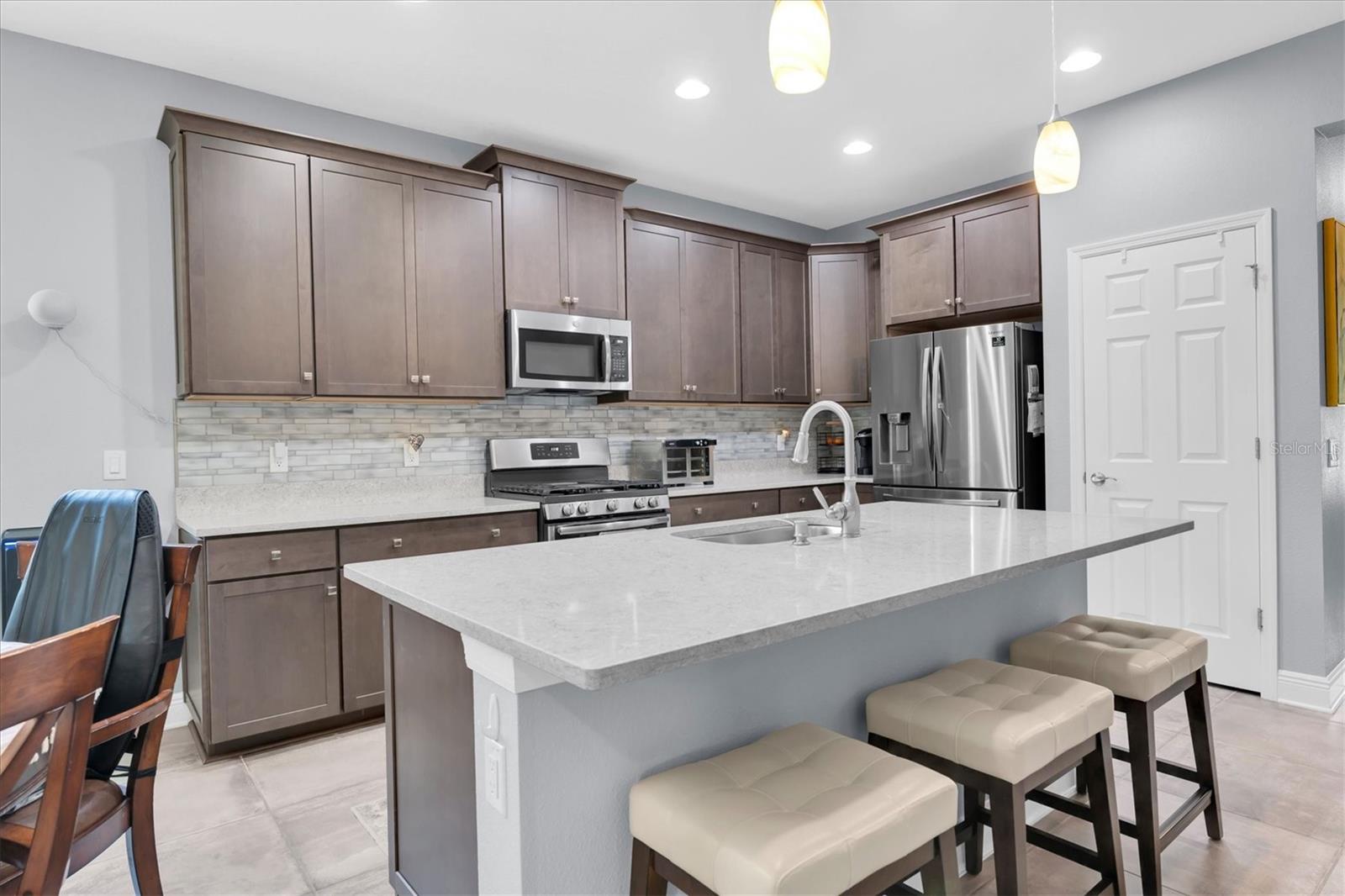 QUARTZ ISLAND WITH ROOM FOR BARSTOOLS
