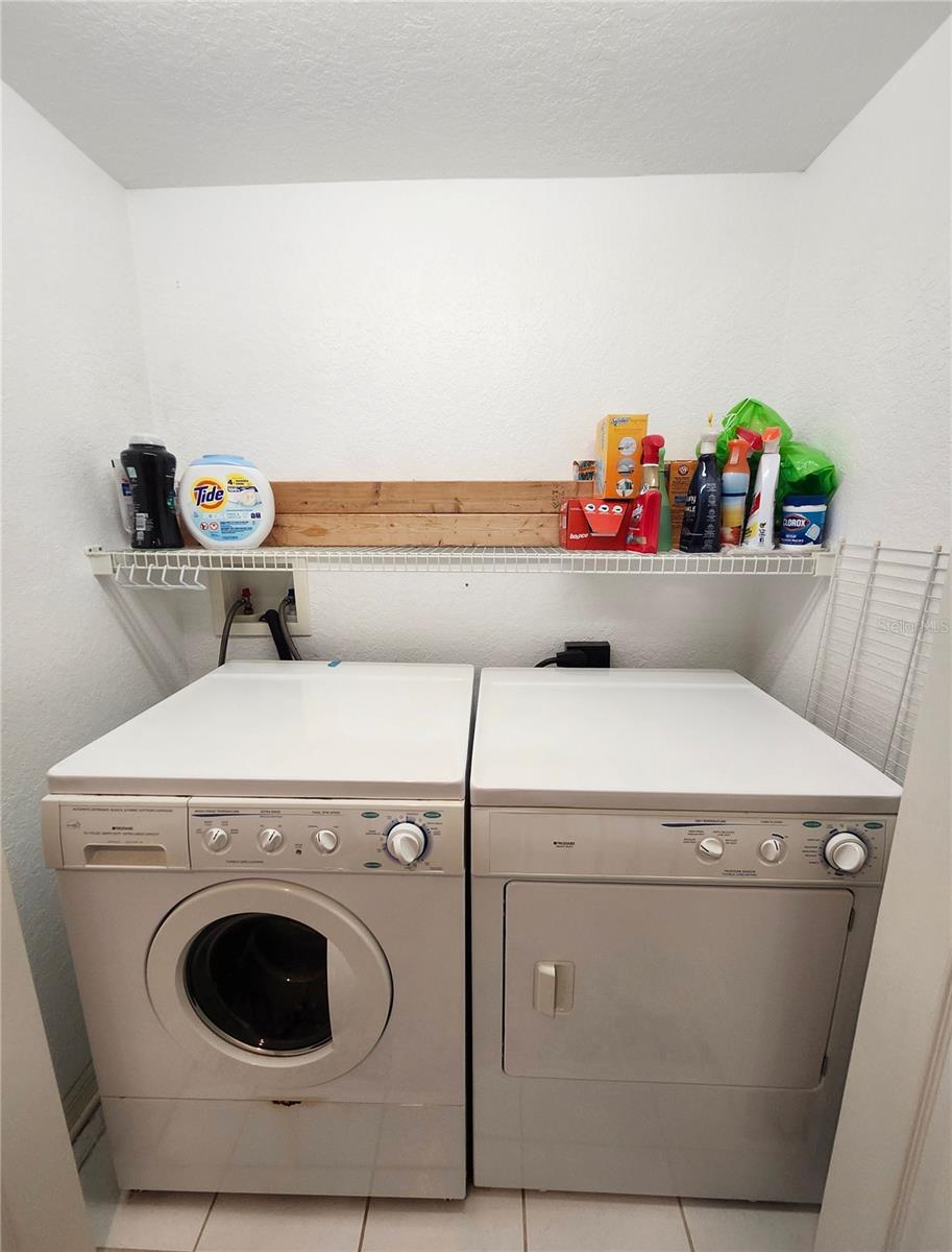 Laundry closet with full sized washer/ dryer