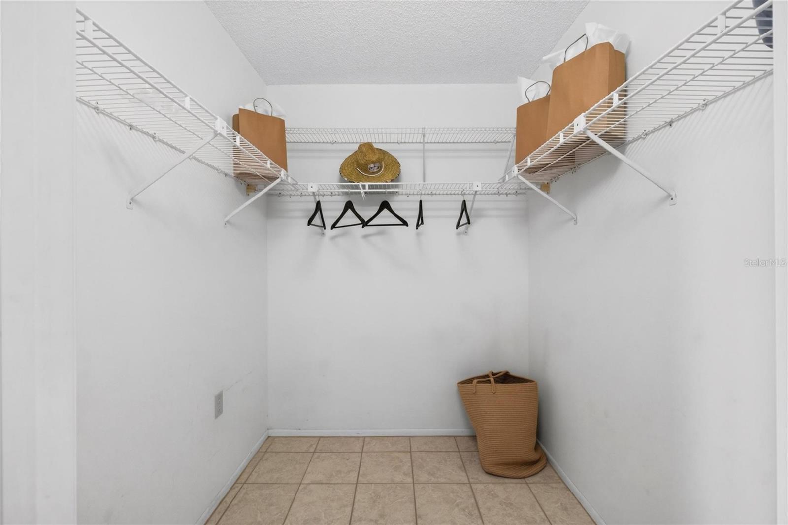 Primary Bedroom walk in closet