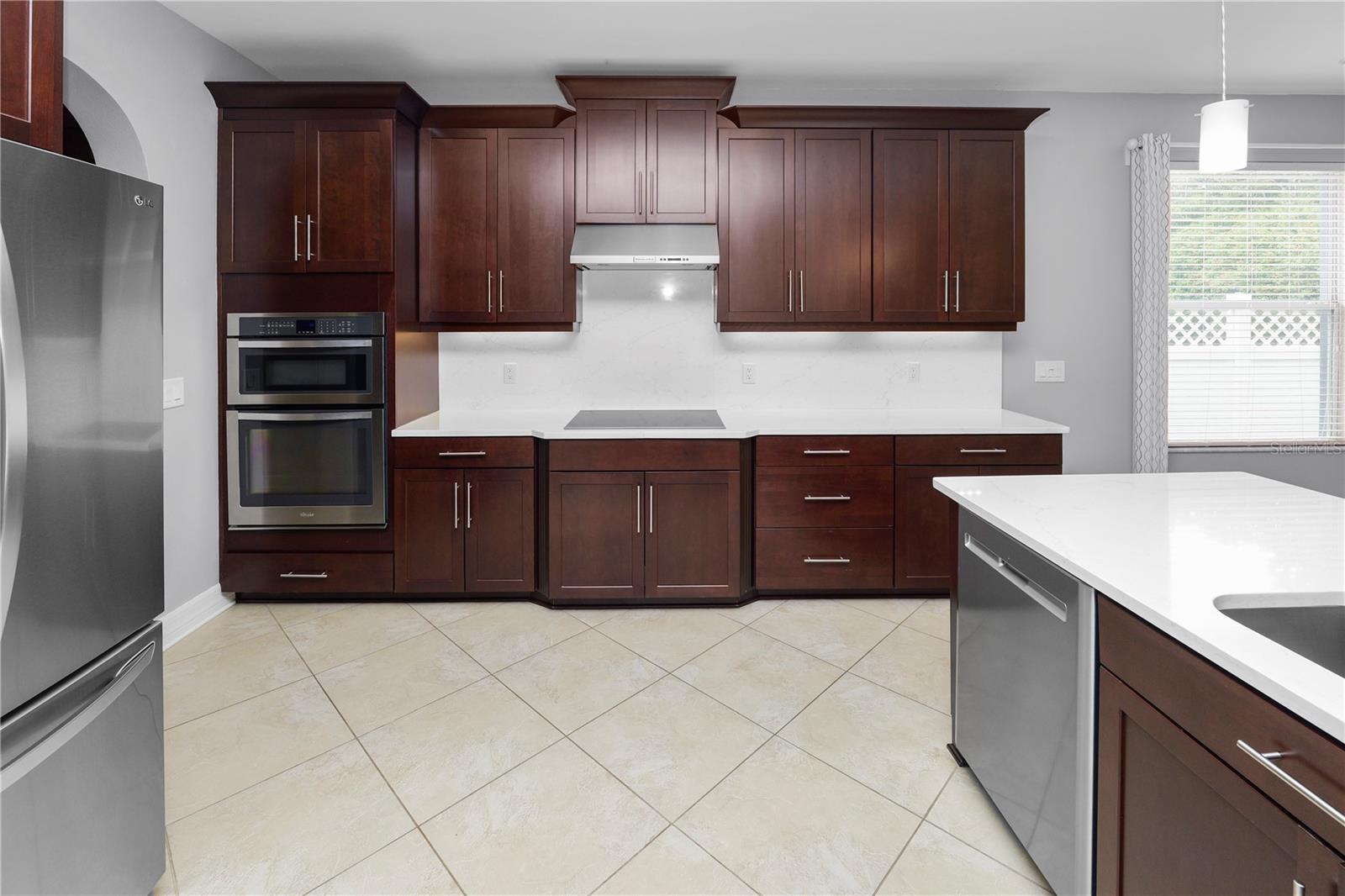 Lighting Under Cabinets, Built in Oven and Microwave, and Chef Refrigerator