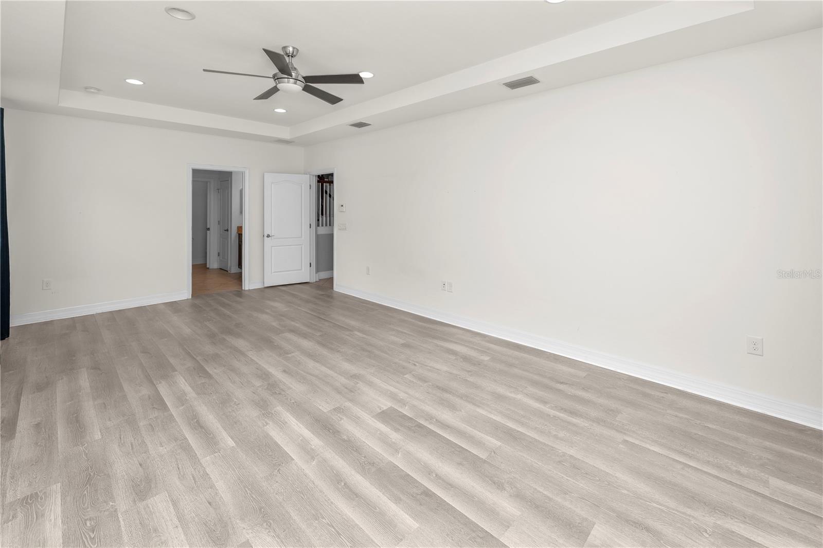 Primary Bedroom on First Level with Laminate Flooring