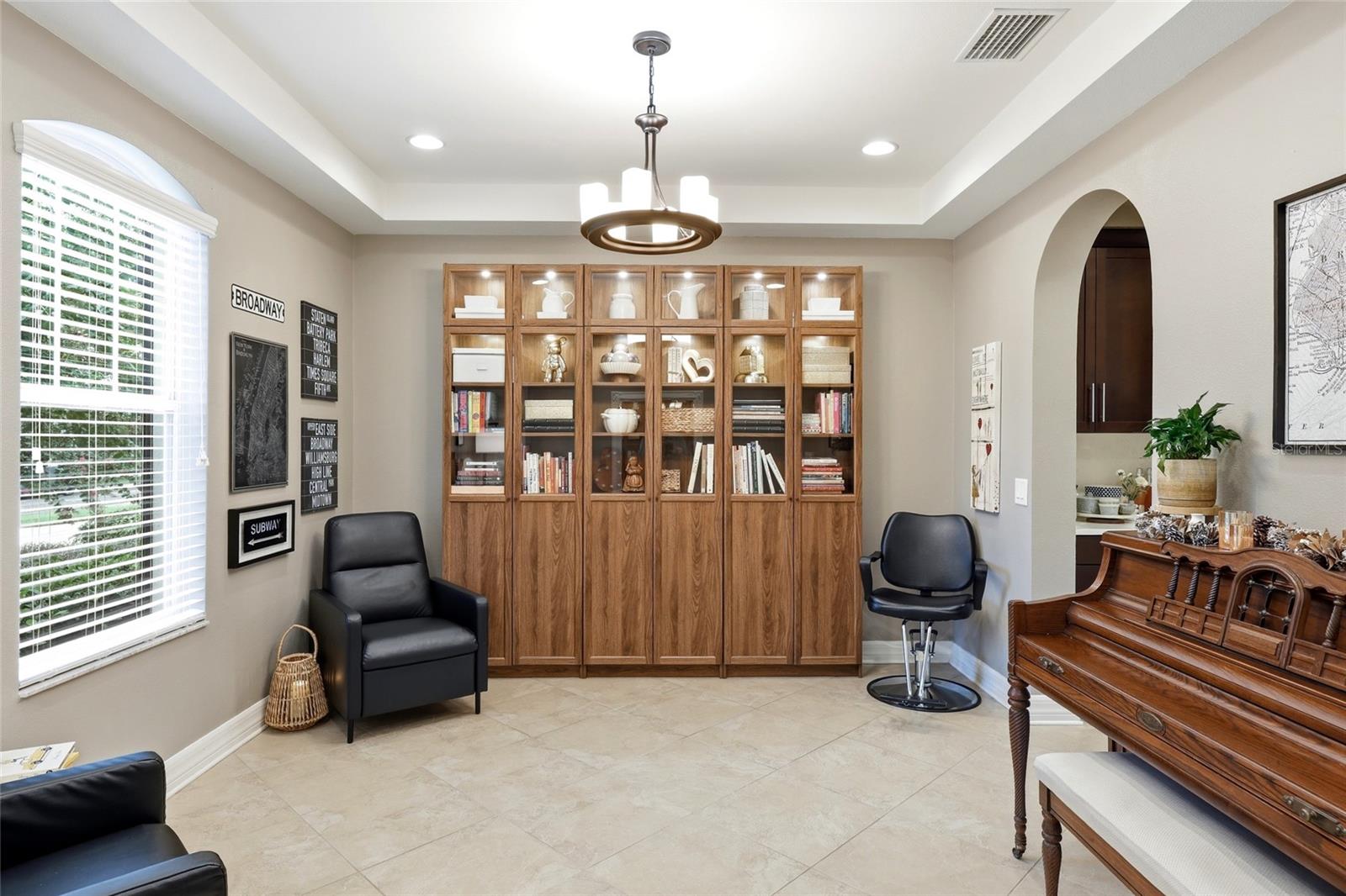 Formal Den/Living Room/Dining Room with Tray Ceiling
