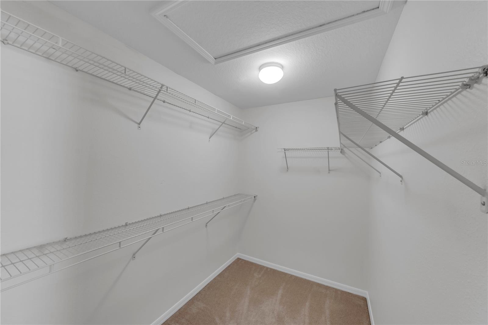 LARGE MASTER BEDROOM WALK IN CLOSET